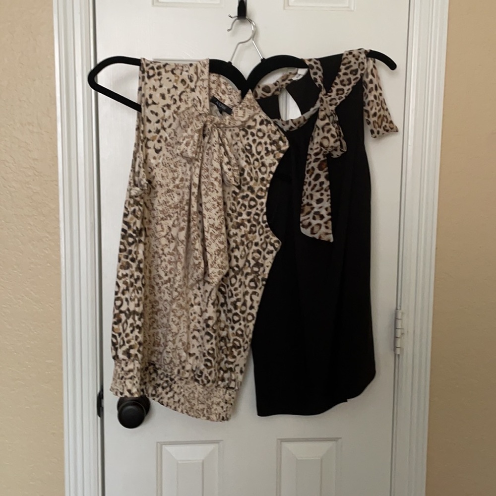 2 sleeveless animal print blouses